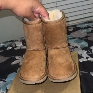 Ugg Boots size 10c, worn 1 time. Great condition.